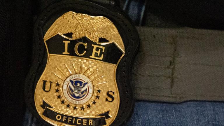 FILE - A federal agent wears an Immigration and Customs Enforcement badge in New York, June 10, 2025. (AP Photo / Yuki Iwamura, File)
